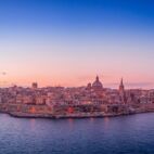 La Valletta sunrise with blue, orange, red, yellow sky in Malta Von tamas